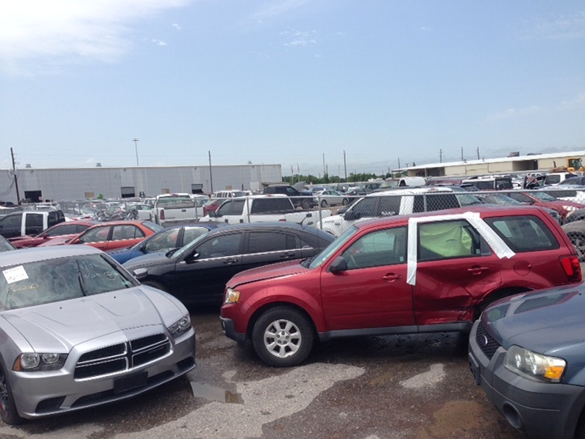 Flood-damaged cars in Houston