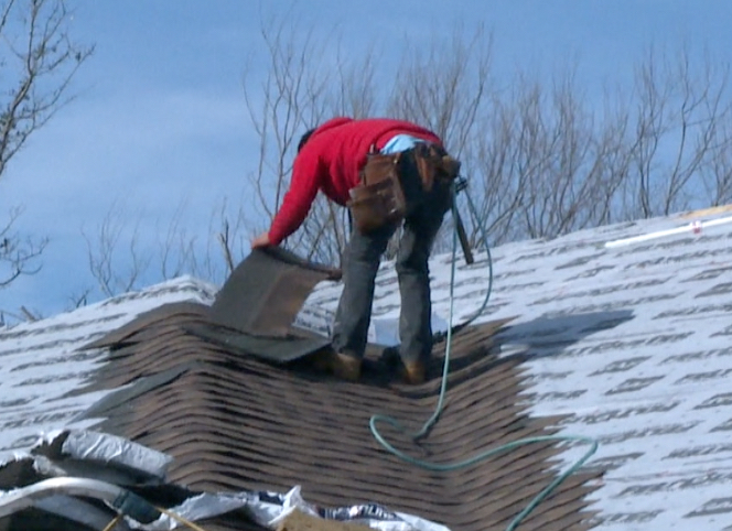 Man working on a roof