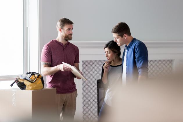 Young couple working with a contractor